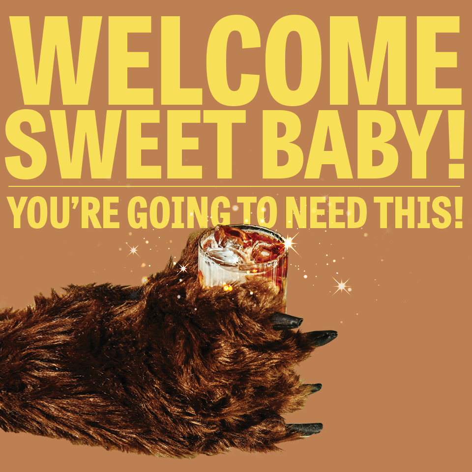 Front of gift card with headline 'WELCOME SWEET BABY! YOU'RE GOING TO NEED THIS!' and a bear paw holding iced coffee