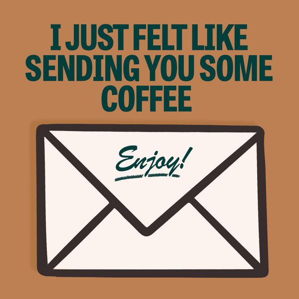 Front of Wandering Bear gift card showing headline 'I just felt like sending you some coffee' above an illustrated envelope with 'Enjoy!'