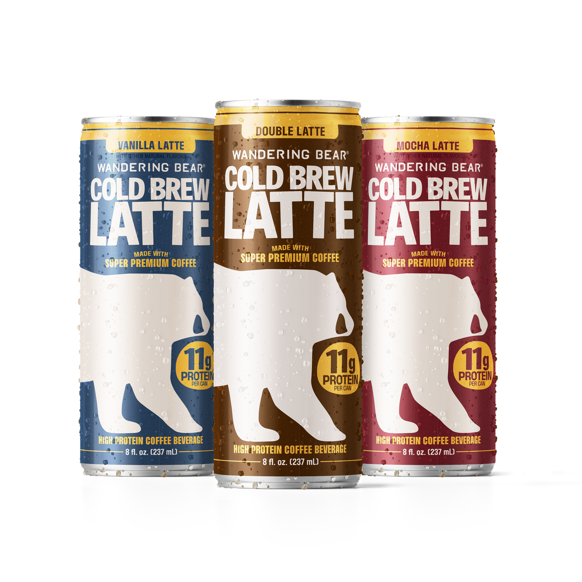 Front view of three Wandering Bear Cold Brew Latte cans (vanilla, mocha, original) on a transparent background